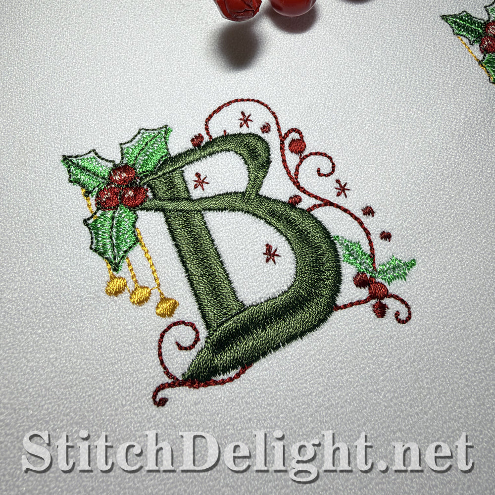 Close-up of Holly Noel monogram letter B with holly and golden baubles