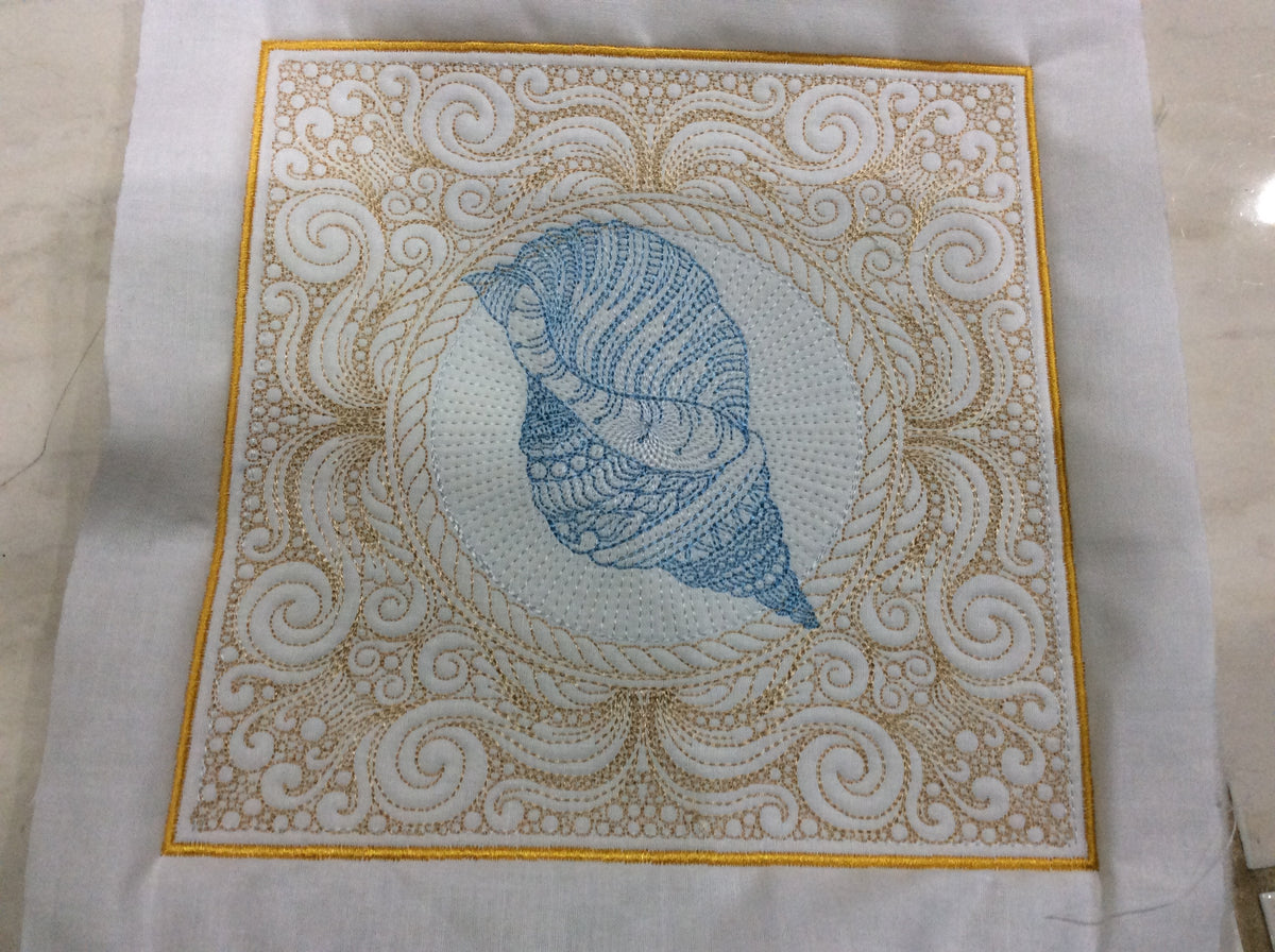 Made by: Laureen – Ocean Shell machine embroidery