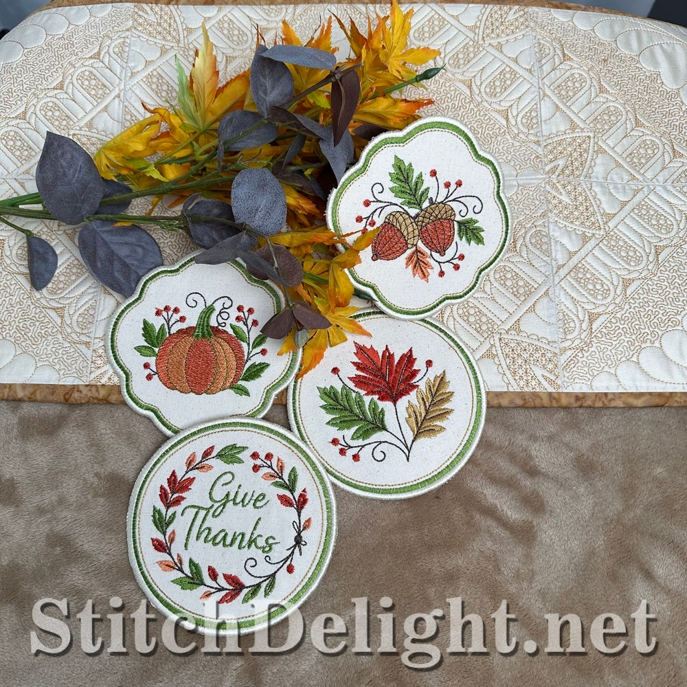 Fall table setting with ITH pumpkin, acorn, leaf and Give Thanks coasters, embroidery design
