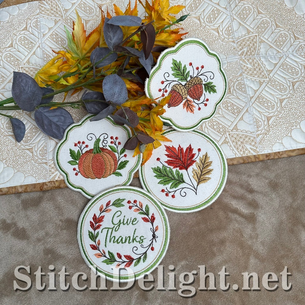 Embroidered Thanksgiving coasters styled with autumn leaves, in the hoop machine embroidery