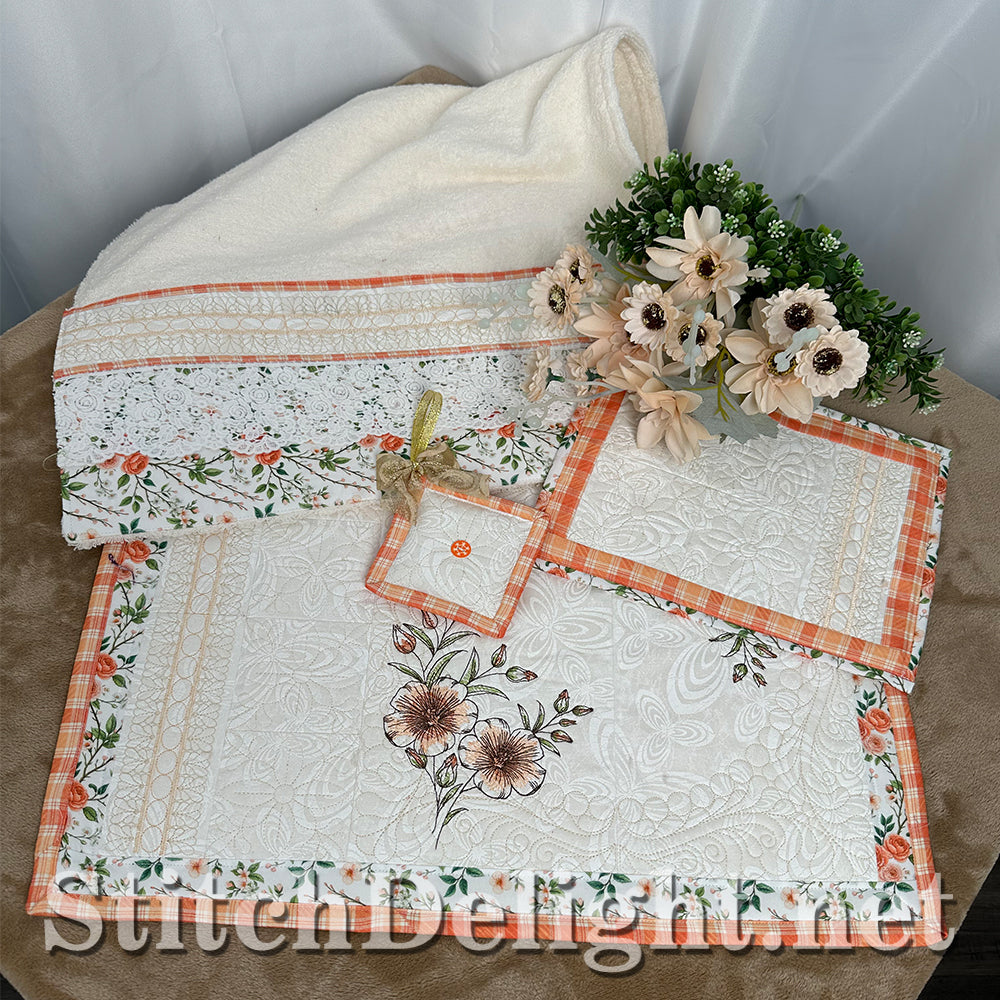 SDS4889 Apricot & Peach Blossom studio overview of finished quilted placemat, mug rug, guest towel, and 3-in-1 ornament / sachet / pin cushion